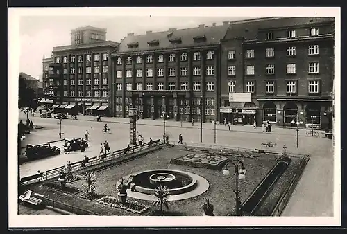 AK Mähr. Ostrau, Bahnhofstrasse mit kleiner Grünanlage