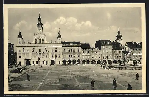 AK Ceské Budejovice, Strassenpartie mit Denkmal