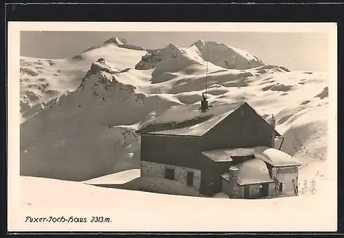 AK Tuxerjochhaus, verschneite Berghütte im Winter