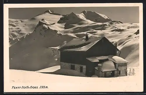 AK Tuxerjochhaus, verschneite Berghütte im Winter