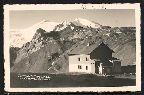 AK Tuxerjochhaus mit verschneiten Bergspitzen