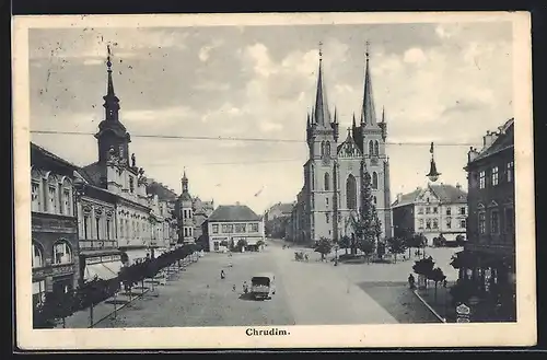 AK Chrudim, Strassenpartie mit Kirche