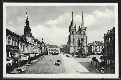 AK Schumberg / Chrudim, Strassenpartie mit Kirche