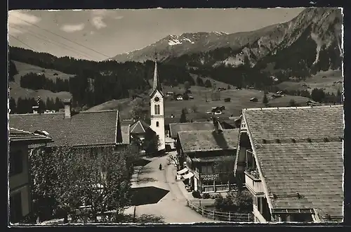 AK Lenk i. S., Dorfstrasse mit Kirche und Wistätthorn