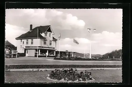 AK St. Peter-Ording, Hauptstrasse mit Buch- und Papierwarengeschäft