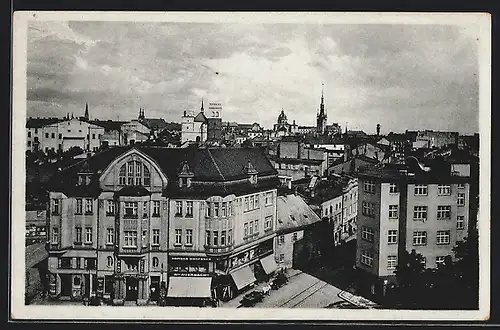 AK Olmütz / Olomouc, Starssenansicht mit Geschäftshaus