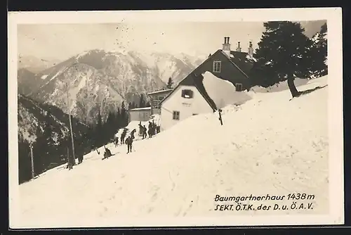 AK Baumgartnerhaus im Schnee mit Wanderern