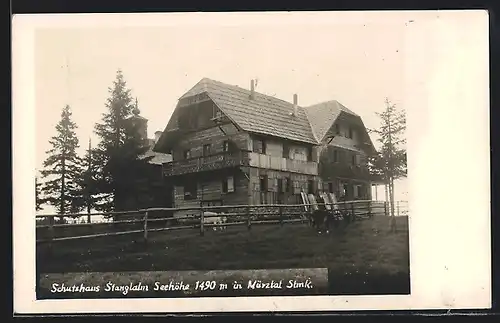 AK Schutzhaus Stanglalm in Mürztal, Ziegen vor der Berghütte