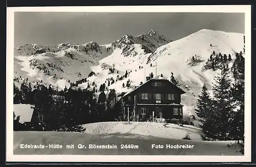 AK Edelraute-Hütte, Berghütte mit Gr. Bösenstein im Schnee
