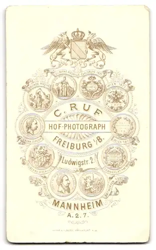 Fotografie C. Ruf, Freiburg i. B., Ludwigstrasse 2, Junge Dame im Kleid mit Hochsteckfrisur