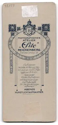 Fotografie Atelier Elite, Reichenberg, Schückerstr. 19, Bürgerlicher Knabe im schwarzen Anzug mit Krawatte