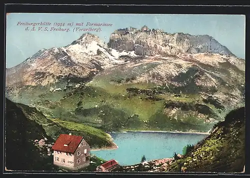 AK Freiburgerhütte, Berghütte mit Formarinsee aus der Vogelschau