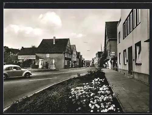 AK Delbrück i. W., Strassenpartie mit Litfasssäule, Auto und Edeka