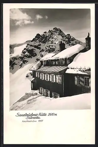 AK Saarbrückner Hütte mit Silvretta im tiefen Schnee