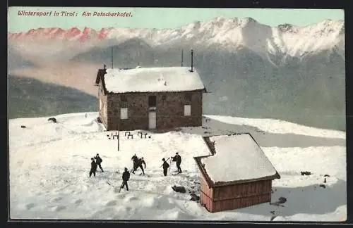 AK Patscherkofelhütte, Gesamtansicht im Schnee mit Skifahrern