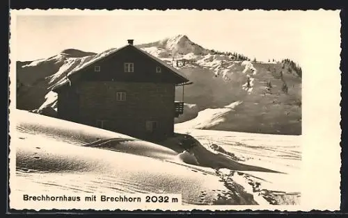 AK Brechhornhaus, Berghütte mit Brechhorn im Schnee