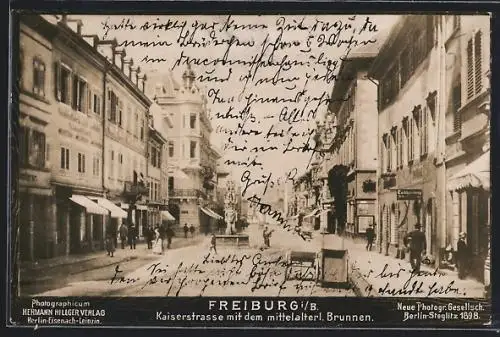 AK Freiburg i. B., Kaiserstrasse mit dem mittelalterl. Brunnen, Neue Photographische Gesellschaft