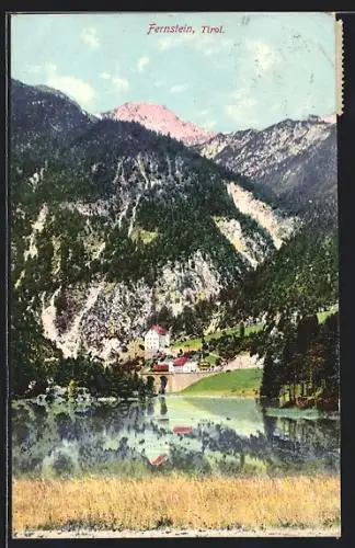 AK Fernstein /Tirol, Blick über das Wasser auf den Ort