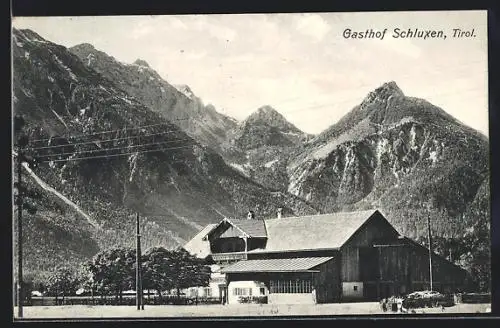 AK Pinswang, Gasthof Schluxen gegen Berge gesehen