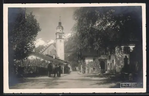 AK Absam, Strassenpartie mit Kirche