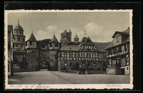 AK Braunfels a. d. Lahn, Marktplatz mit Geschäft und Tor