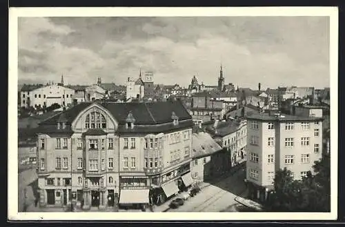 AK Olmütz / Olomouc, Starssenansicht mit Geschäftshaus