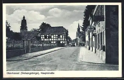 AK Oberkassel /Siebengebirge, Hauptstrasse mit Gasthof und Türmen