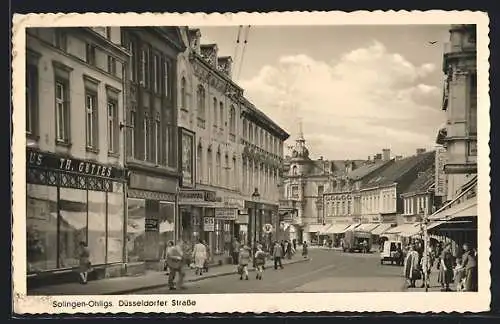 AK Solingen-Ohligs, Düsseldorfer Strasse mit Theater und Geschäften