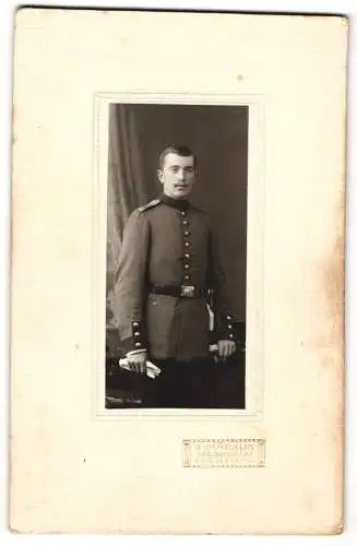 Fotografie R. Märklin, Freiburg i. Br., Kaiserstr. 10, Soldat Rgt. 113 in Uniform mit Schnauzbart