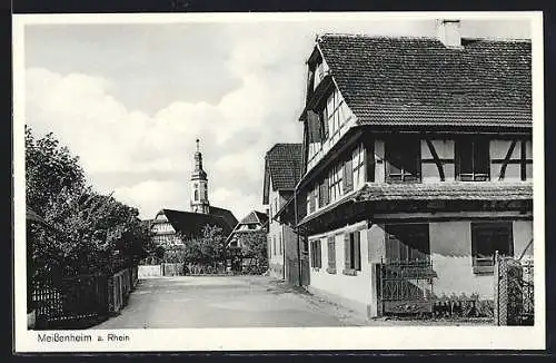 AK Meissenheim a. Rhein, Strassenpartie mit Kirche