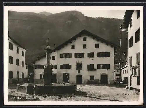 AK Andeer, Dorfplatz mit Brunnen