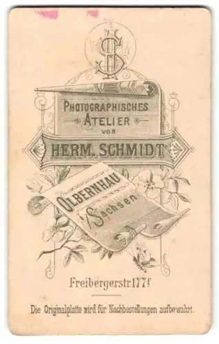 Fotografie Herm. Schmidt, Olbernhau i. Sa., Monogramm des Fotografen über Anschrift auf Zeitung