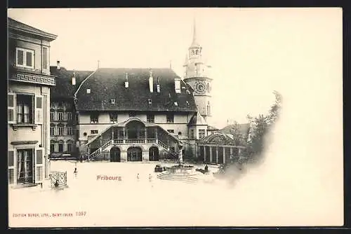 AK Fribourg, Gebäudepartie am Brunnen