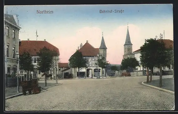AK Northeim, Bahhof-Strasse mit Kirche