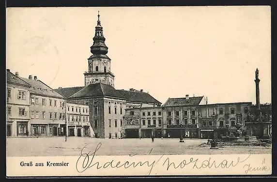 AK Kremsier, Strassenpartie mit Denkmal