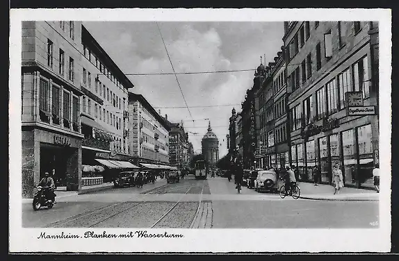 AK Mannheim, Planken mit Geschäften, Wasserturm und Strassenbahn
