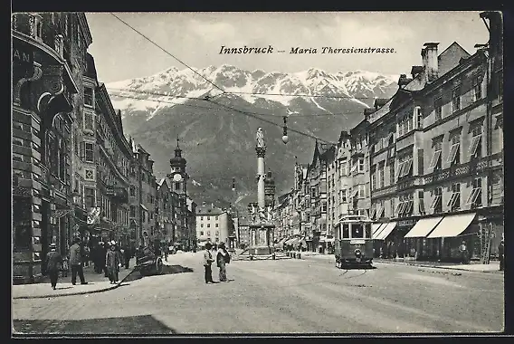 AK Innsbruck, Maria Theresienstrasse mit Geschäften, Denkmal und Strassenbahn