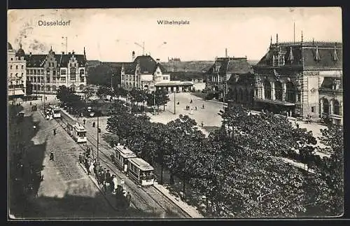 AK Düsseldorf, Wilhelmplatz mit Strasse und Strassenbahnen