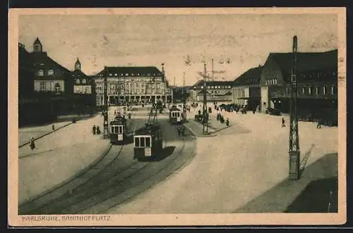 AK Karlsruhe, Bahnhofplatz mit Strassenbahnen