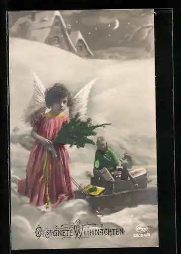 AK Kleiner Weihnachtsengel mit Geschenken auf einem Schlitten im Schnee
