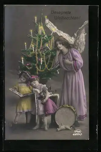 AK Weihnachtsengel schaut über beschenkte Kinder