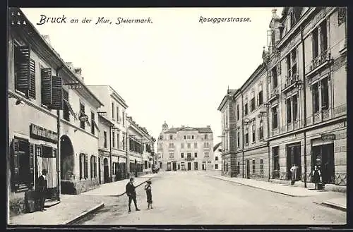 AK Bruck /Mur, Roseggerstrasse mit Geschäften