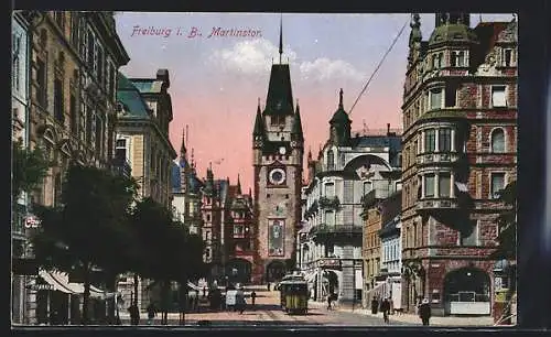 AK Freiburg i. Br., Blick auf das Martinstor mit Strassenbahn