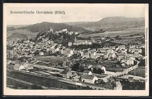 AK Gerolstein, Ortsansicht mit Bahnhof und Bergpanorama