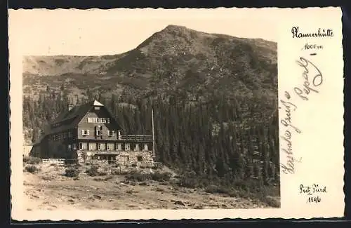 AK Plannerhütte vor bergiger Landschaft