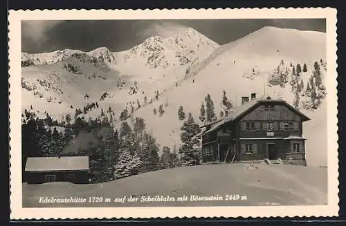 AK Edelraute-Berghütte auf der verschneiten Scheiblalm mit Bösenstein