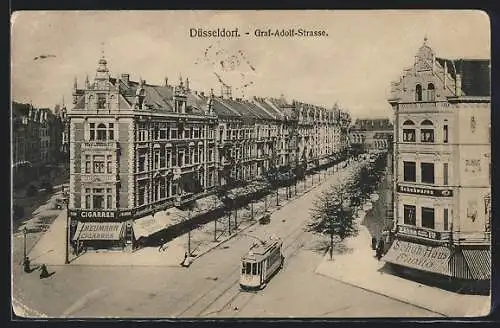 AK Düsseldorf, Graf-Adolf-Strasse mit Geschäften und Strassenbahn