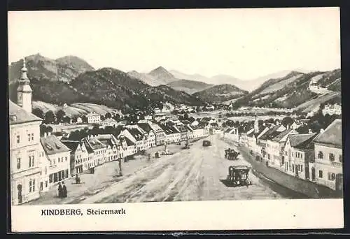 AK Kindberg, Strassenpartie mit Kutschen und Brunnen