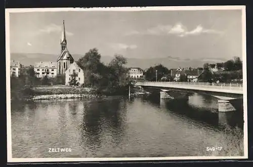 AK Zeltweg, Ortsansicht mit Brücke u. Kirche am Fluss