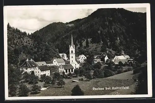 AK Rachau bei Knittelfeld, Ortsansicht mit Kirche gegen einen Berg